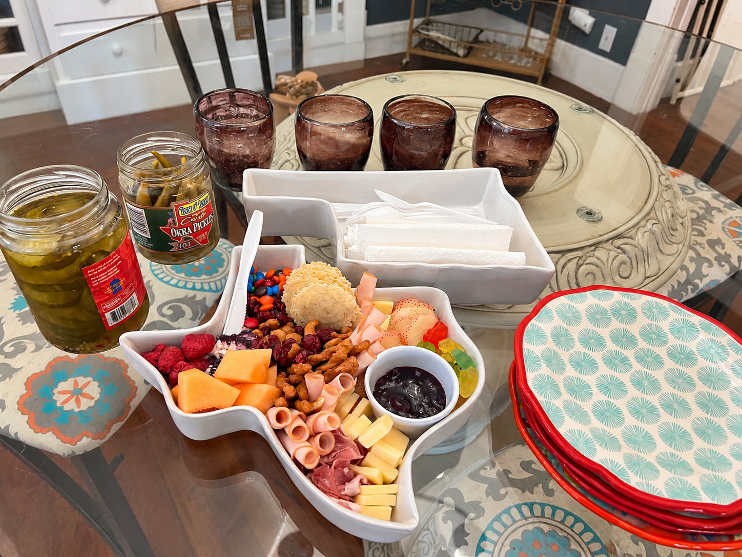 Texas-shaped charcuterie spread and serving pieces at The Blue Jean Bungalow